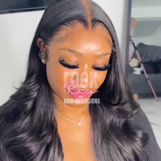 Beautiful black girl with HD lace frontal. Her wig looks as though it is growing from her scalp.